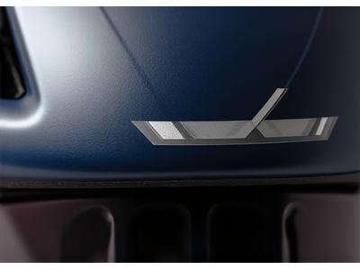 Cyclist's helmet with custom a minimalist white stripe sticker